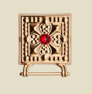 Veskestøl, forgylt med raud stein